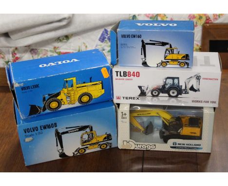 One box containing five various earth moving and construction related diecast vehicles to include an NZG No. 867 Terex TLB 84