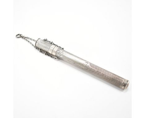 An early 20th Century Edwardian silver hallmarked thermometer case. The case having engine turned decoration with unengraved 