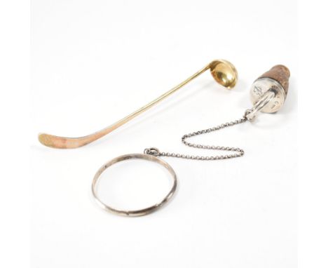 A late 19th Century Austro Hungarian silver bottle stopper with a silver sauce ladle. The bottle stopper having round finial 