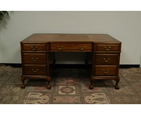 A mid 20th century light mahogany twin pedestal desk, AF, 1565cm wide, 90cm deep and 77cm high