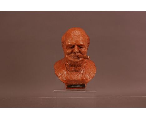 A mid 20th century ceramic bust of Churchill as a light, 21cm high, removable cigar, marked to the reverse