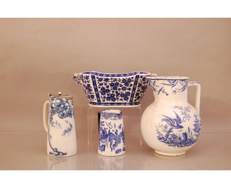 A group of 19th century blue and white ceramic items, comprising, a large water jug with bird design by Ridgeway 27cm high, a