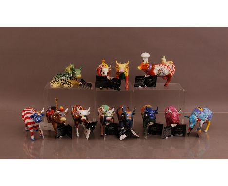 A collection of ceramic Cow Parade cows, comprising American related examples (12)