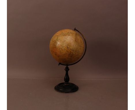 A early 20th century 'Geographia' 8 inch Terrestrial globe, 37cm high, on a turned ebonised wooden stand, some damage to the 