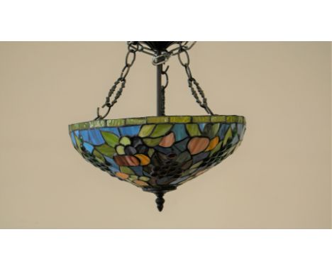 A second half 20th century stained glass ceiling light, in the Tiffany style, with two light bulb fittings, 35cm diameter
