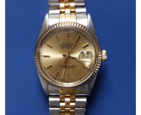 A boxed gent's stainless steel &amp; gold Rolex Oyster Perpetual Datejust wrist watch with gold dial &amp; markers, case diam