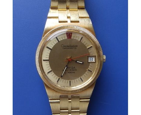 A boxed gent's 18ct gold Omega Constellation Chronometer Electronic f300 bracalet wrist watch, case diameter 35mm, with origi