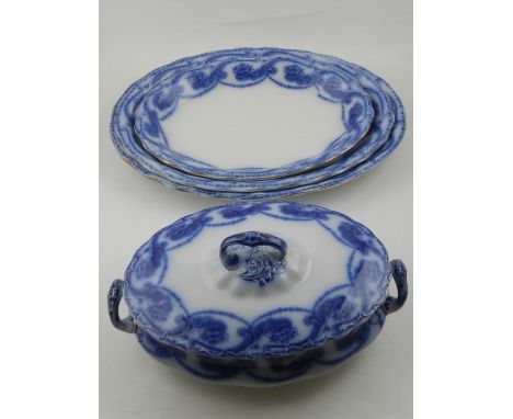 An early 20th century blue and white transfer ceramic centre dish, together with three matching oval dishes. 