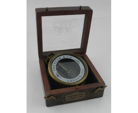 A boxed map reader compass with magnifying glass.