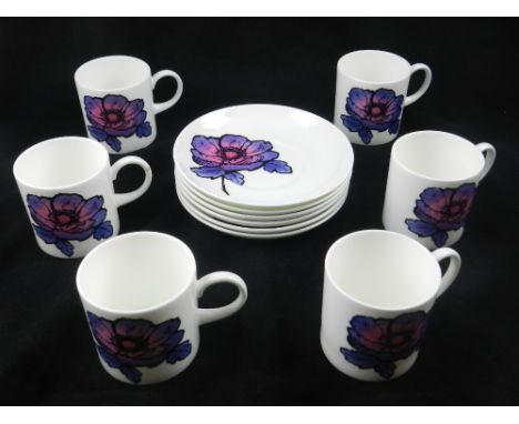 Wedgwood, England. A set of six porcelain tea cups and saucers, decorated in the Susie Cooper 'anemone' design.