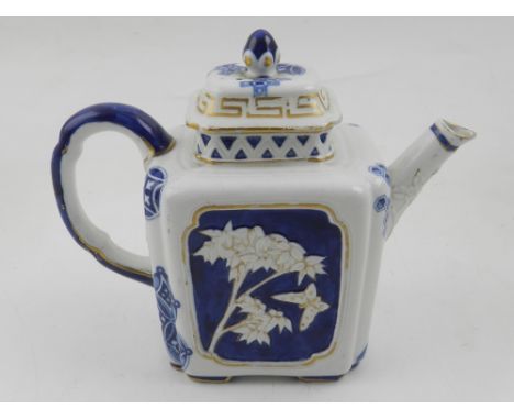 An early 19th century Royal Worcester blue and white tea pot, in the Japanese taste, bears stamped mark to base and impressed