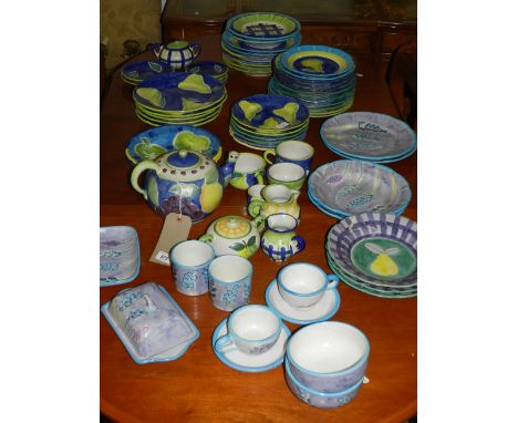A large and comprehensive Designer's Guild tea/dinner service, decorated with a bold contemporary pattern, (qty)