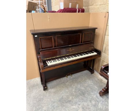 Steinway (c1912) An upright piano in a rosewood case: together with a stool. IRN: 1PJ3M49MA condition report for this Lot wil