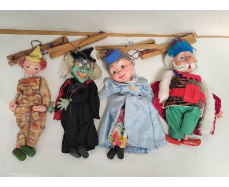 Four unboxed vintage Pelham Puppets marionettes to include King & Queen, Witch etc. (4)Condition:Queen - Rubbing to hair.King