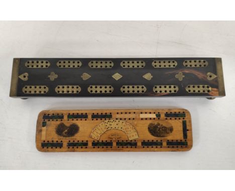 Two Victorian cribbage boards, one of ebony and brass construction, the other being a Mauchline Ware example with views of Du