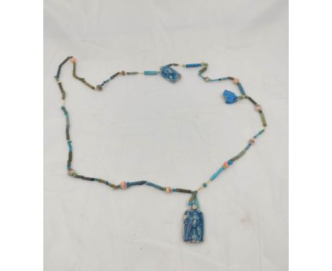 Ancient Egyptian. Glass and steatite bead necklace measuring 39cm in length with enamel pharaoh amulets.