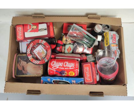 Box of vintage Coca Cola memorabilia to include a 2013 Jean Paul Gaultier Diet Coke, a 1992 Euro Disney lunchbox and a 1988 B