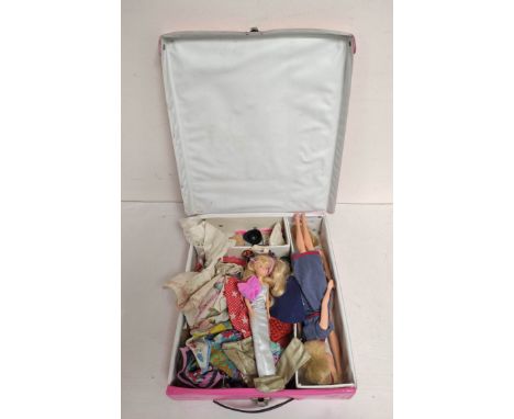 Collection of vintage 1960s/1970s Barbie dolls in a World of Barbie Doll Case by Mattell 1968 No1002. With various clothes. 