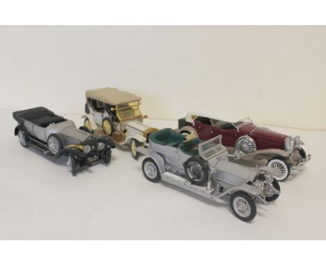 Four Franklin Mint Precision Models, 1:24 scale die-cast collector's cars to include a 1930 Duesenberg J Derham Tourster, Rol