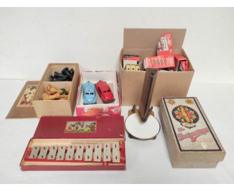 Collection of vintage 1950s toys to include two die-cast friction cars, quantity of doll's house furniture, a boxed Designosc