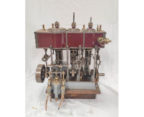 Early 20th century model three cylinder compound marine steam engine of cast iron construction, unsigned with force pump. H50