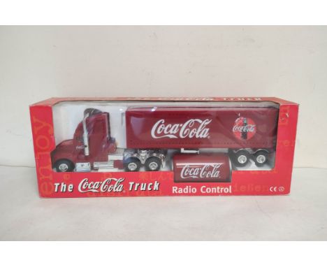 Vintage 1990s boxed Coca Cola radio controlled Coca Cola truck. 