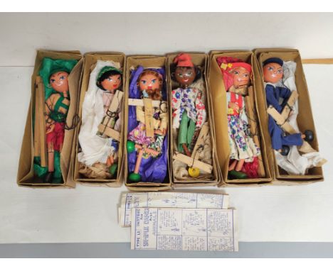 Six vintage Pelham Puppets marionettes to include Sailor type SS, Tyrolean Boy etc. All with original boxes, two with instruc