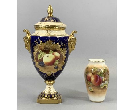 TWO VASES: Coalport lidded vase with cobalt blue ground, panel painted with fruit, signed 'M. Holdsworth' within gilded carto