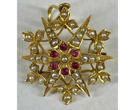 VICTORIAN 15CT GOLD GARNET & SPLIT SEED PEARL OPENWORK STAR BROOCH, 25mm (diam.), 5.1gmsProvenance: private collection Powys
