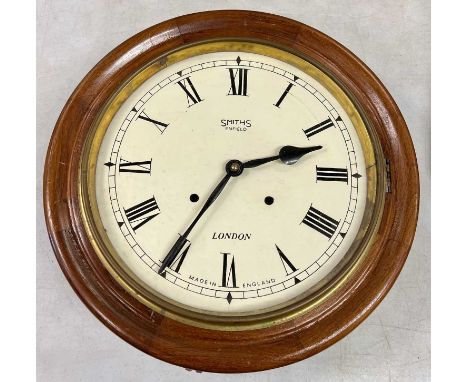 SMITHS ENFIELD LONDON DIAL CLOCK, circular mahogany case, white enamel dial with black Roman numerals, 41cms (diam.) along wi