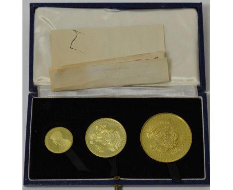 'President Kennedy Memorial Medal Set, comprising 3 x hallmarked 18ct gold medals: 40mm (35.2g), 32mm (17.68g) & 22mm (8.05g)