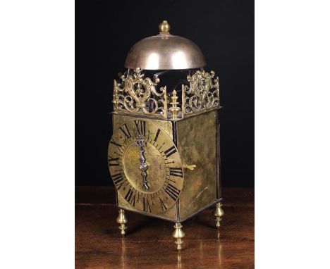 An 18th Century Thirty Hour Brass Lantern Clock Circa 1720. The centre engraved with maker's name Jean du Lierre à Angers amo
