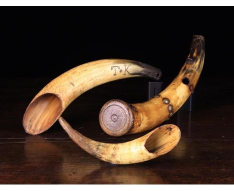 A Late 18th/Early 19th Century Ox-horn Drenching Horn with closed pointed end 8¾ in (22.6 cm) in length. A larger example wit