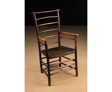 A Rare 18th Century Ash &amp; Elm Ladder-backed Armchair. The turned top rail with tapered ends pierced through by the pole t