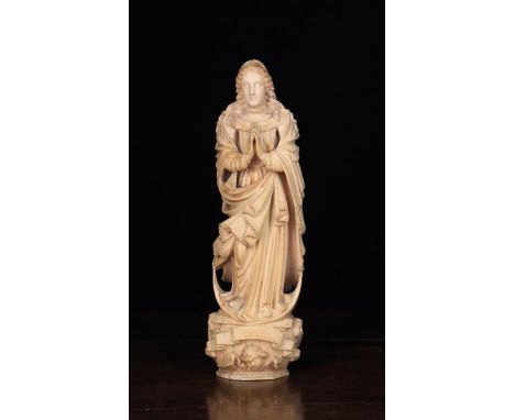 An Antique Ivory Carving of The Virgin of the Immaculate Conception, Goa, Indo-Portugese, 18th Century.  The Virgin depicted 