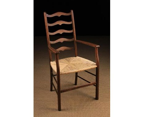 A Modern Rush-seat Ladder-back Armchair.
