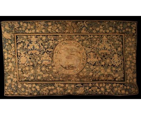 An 18th Century Woolwork Tapestry centred by a petit-point allegorical roundel depicting Rebecca at the Well encircled by a w