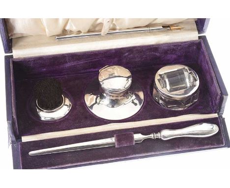 BOXED SILVER FOUR PIECE DESK SET.BIRMINGHAM 1909.WITHIN AN ENGRAVED BOX.H.PIDDICH & SON'S GOLDSMITHS.MAKER HANLEY H.C.D.SLIGH