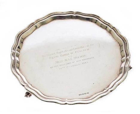 CIRCULAR SILVER SALVER ON THREE SCROLLED FEET.SHEFFIELD 1937.MAKER EV.INSCRIBED "THE PROVOST MAGISTRATES AND COUNCILLOR OF RO