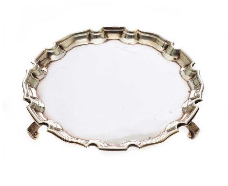 CIRCULAR SILVER CARD TRAY ON THREE SCROLLED FEET.BIRMINGHAM 1933.INSCRIBED TO BASE "TO MISS JEAN MICHIE ON THE OCCASION ON HE