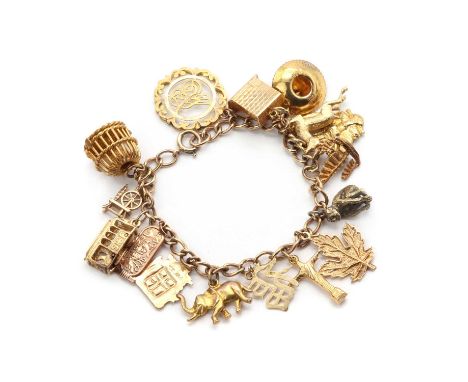 A gold charm bracelet,a 9ct gold curb link bracelet with a half solid bolt ring, 188mm long, suspending sixteen charms, to in