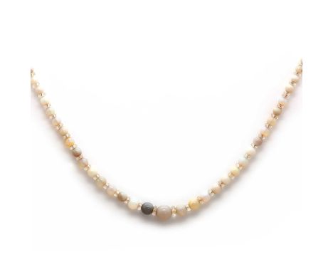 An Edwardian opal and faceted rock crystal bead necklace,with graduated circular opal beads, from 4.7 to 8.1mm in size. Facet