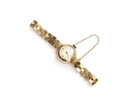 A ladies' 9ct gold Tissot mechanical bracelet watch,16mm diameter, a round case with a silvered dial, baton hour markers with