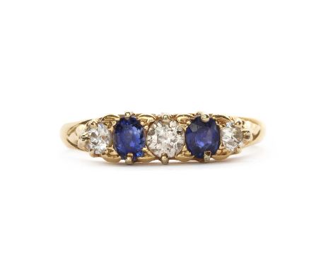 A gold five stone sapphire and diamond ring,old European cut and Swiss cut diamonds, with two oval mixed cut sapphires betwee