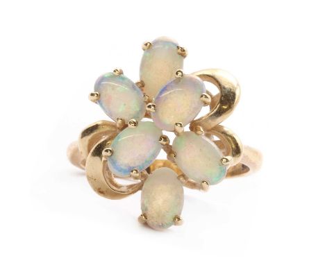 A gold opal cluster ring, tested as approximately 14ct gold, 4.04g.Finger size K½Condition ReportSurface marks/scratches to m