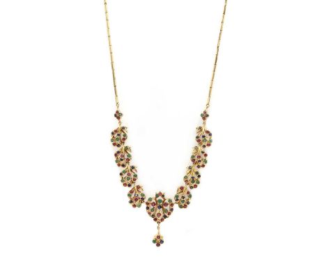 A gold synthetic gem set necklace,the front half with foliate links claw and grain set with synthetic emeralds, synthetic rub