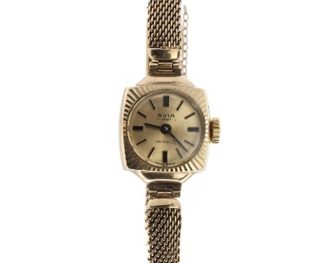 A ladies' 9ct gold Avia mechanical bracelet watch,a square barrel case with machine engraving, 13mm diameter, a gilt dial wit