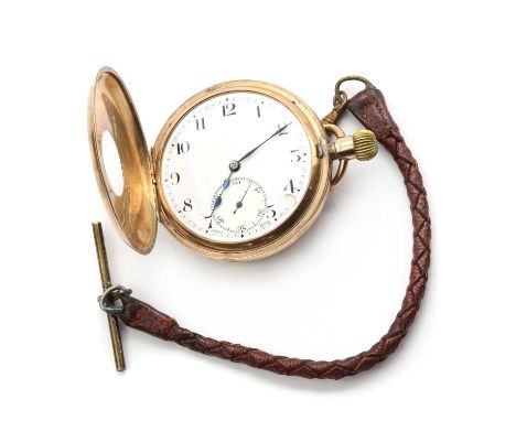 A 9ct gold side wind half hunter pocket watch,50mm diameter, with a black enamel Arabic numerals chapter ring to the front co