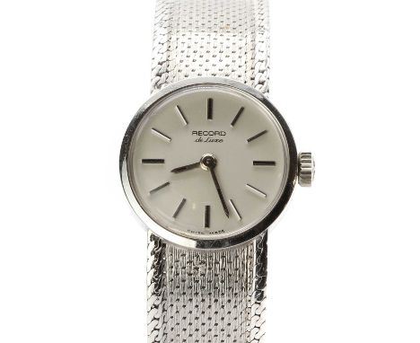 A ladies' 9ct white gold Record 'De Luxe' mechanical bracelet watch, 18mm diameter, a silvered dial with baton hour markers a