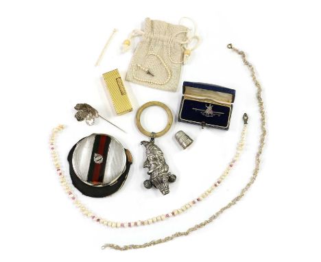 A collection of silver and jewellery, comprising a silver and enamel 'The Royal Norfolk Regiment' brooch, a rolled gold Dunhi